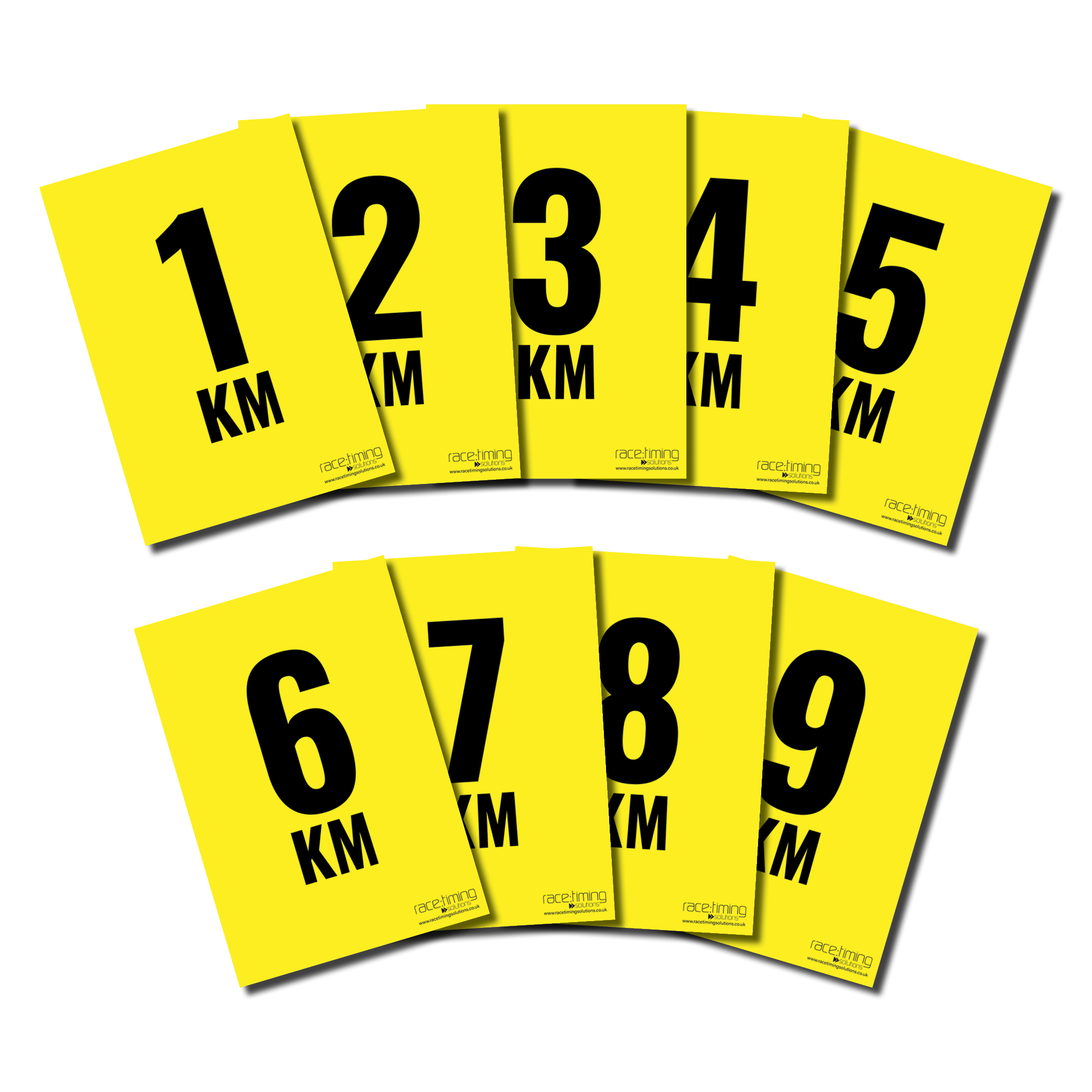 Set of yellow distance markers with black numbers and 'KM' text with RTS branding