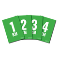 Four green distance markers with white numbers 1 to 4km with RTS branding