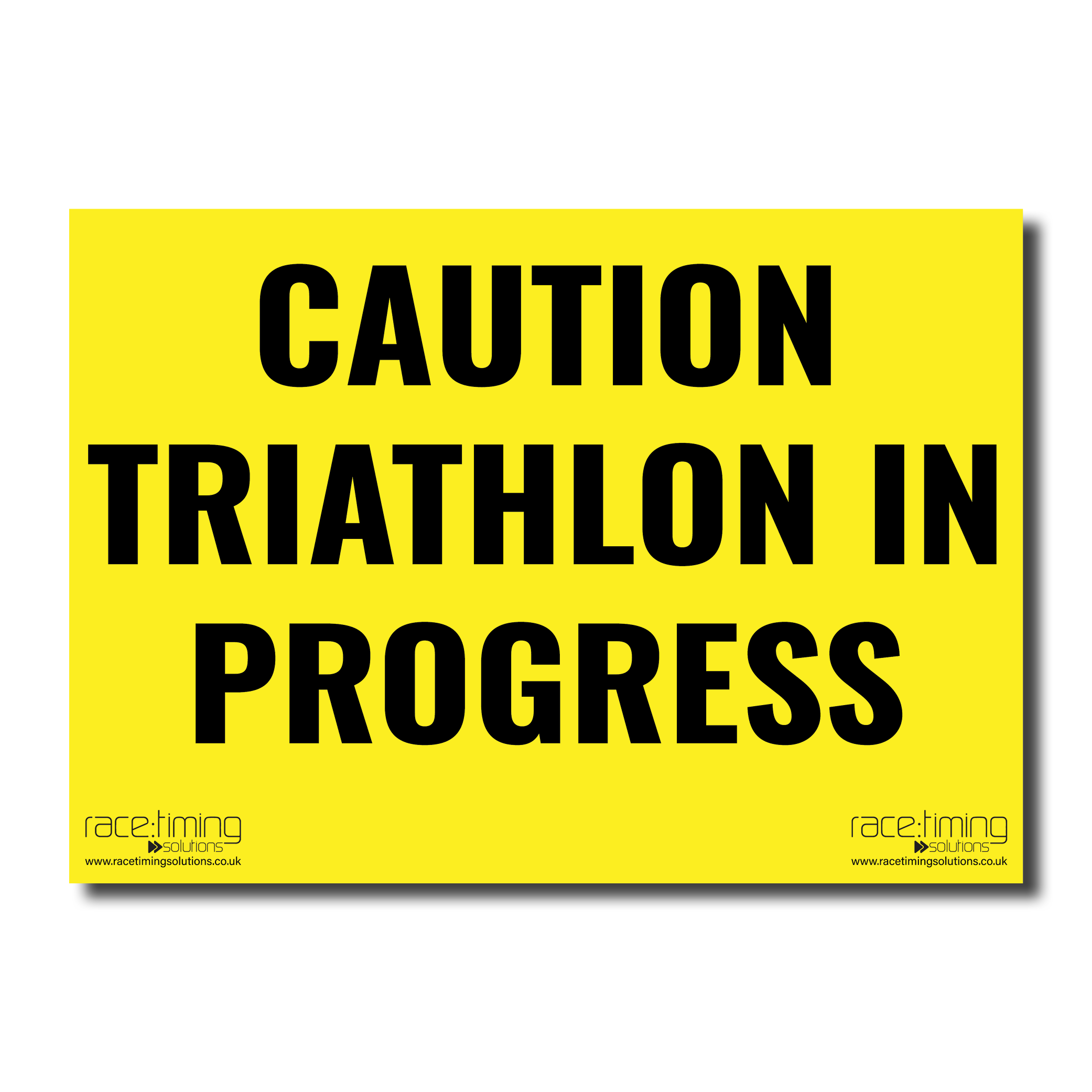 Yellow sign with black text 'CAUTION TRIATHLON IN PROGRESS'