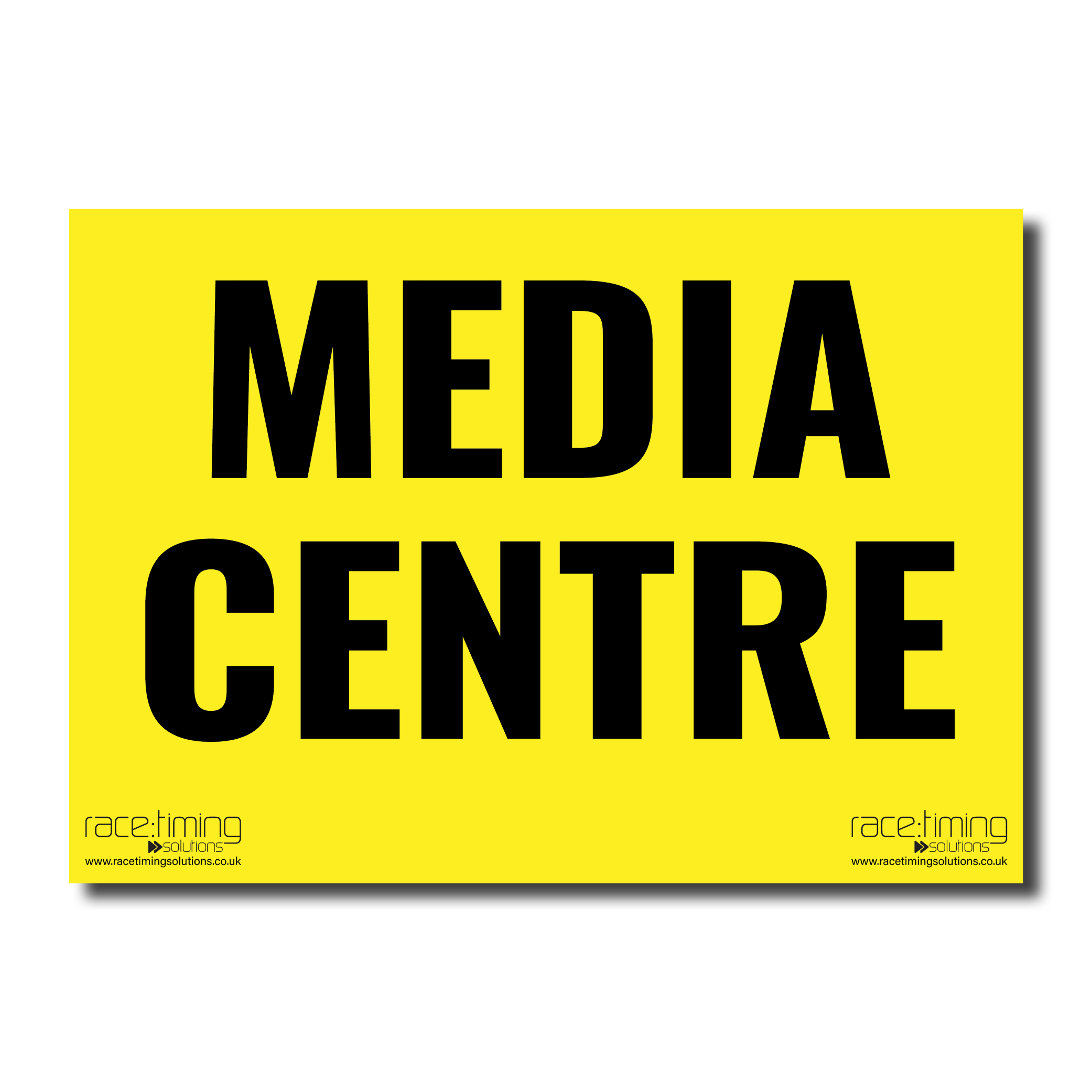 Yellow sign with 'MEDIA CENTRE' in black text