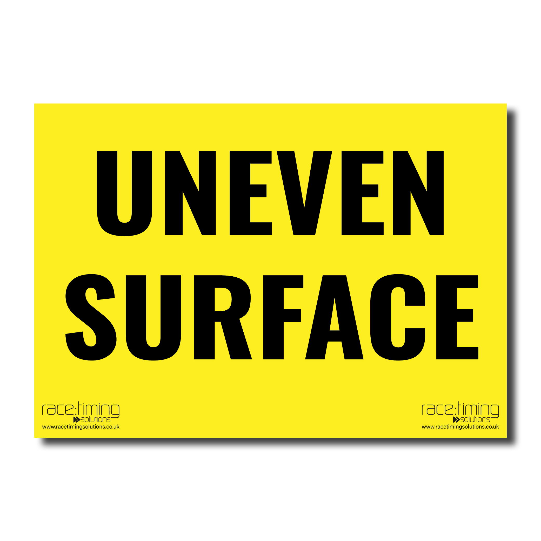 Yellow sign with black text 'UNEVEN SURFACE' 
